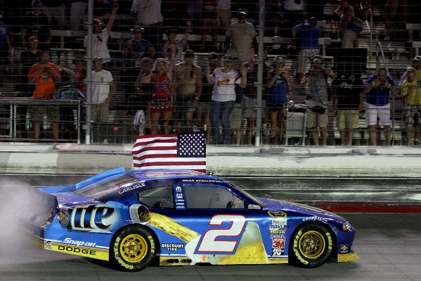 Credit: Jerry Markland/Getty Images for NASCAR Brad Keselowski does donuts for fans at Bristol Motor Speedway after winning the NASCAR Sprint Cup Series Irwin Tools Night Race at Bristol Motor Speedway on Saturday.